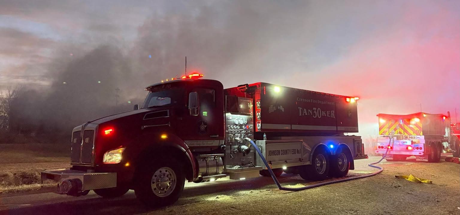 Fouts fire tanker and apparatus with emergency lights illuminated